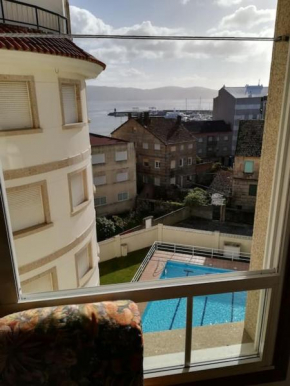 Apartamento en edificio nuevo, con piscina, vistas a la ría y al puerto, ESTANCIA MÍNIMA 14 noches, perfil familiar, no se admiten grupos de jovenes